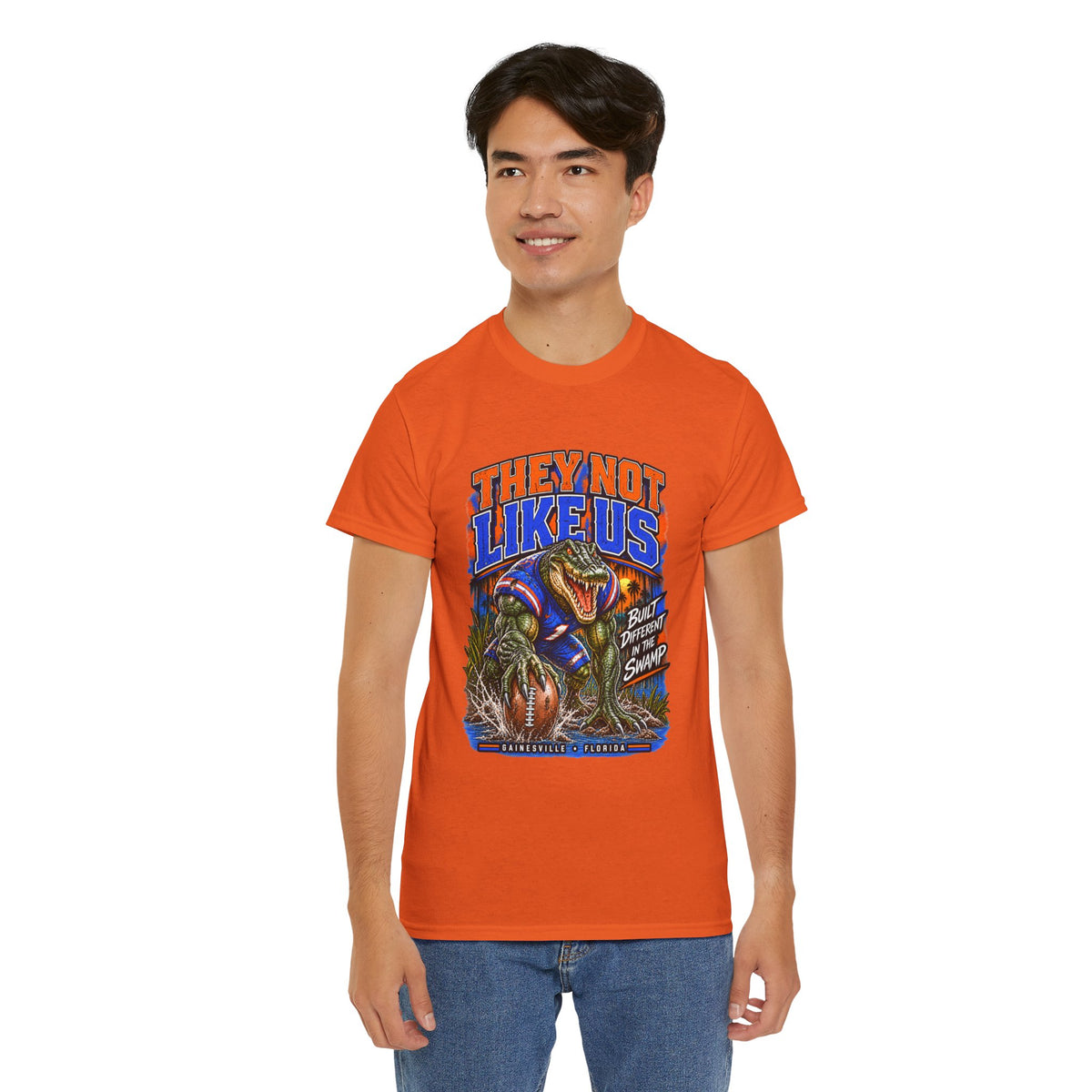 They Not Like Us Alligator Football T-Shirt | Swamp Monster Sports Tee